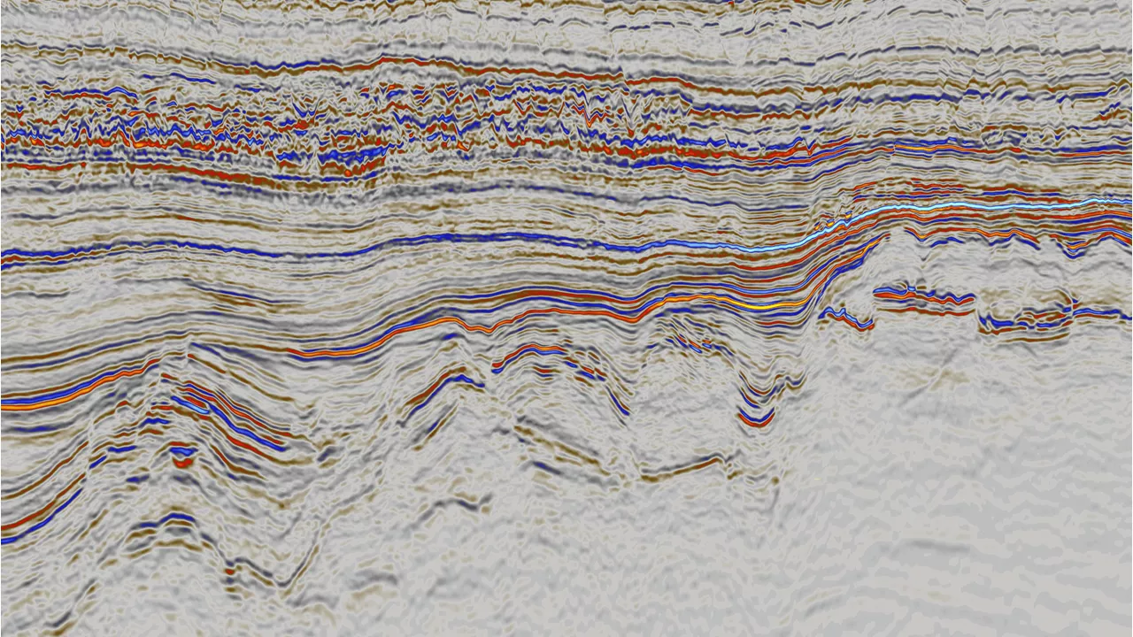 West-East orientated seismic section from the 60 Hz RTM dataset, highlighting the complex structural settings and depositional features, with targets spanning from Triassic to Paleocene.